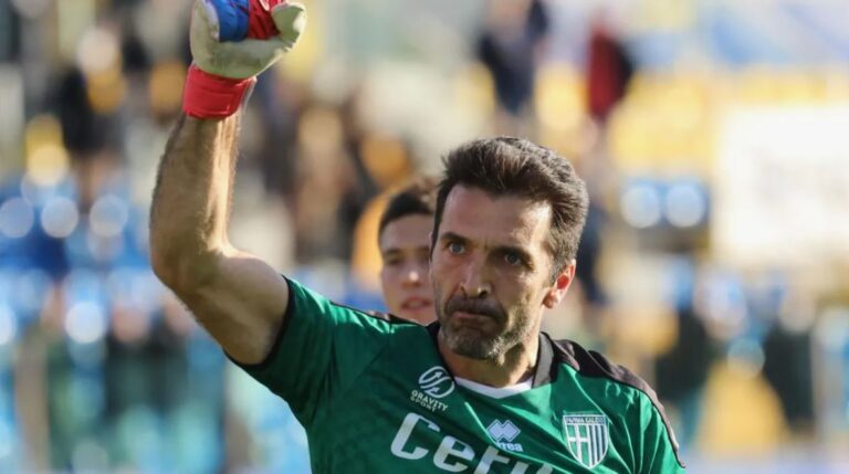 Gianluigi Buffon punching the air in celebration in an upwards motion.